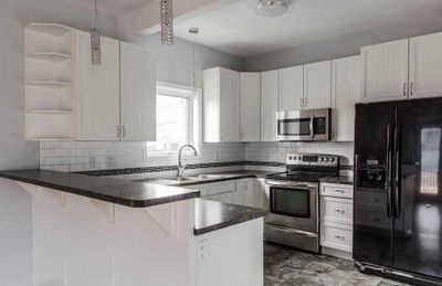 10307 96 St, Home with 6 bedrooms, 3 bathrooms and null parking in Clairmont AB | Image 2