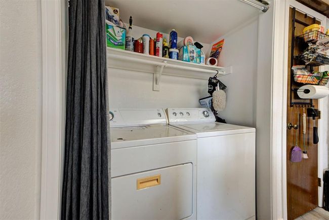 Washroom with laundry area and washing machine and dryer | Image 7