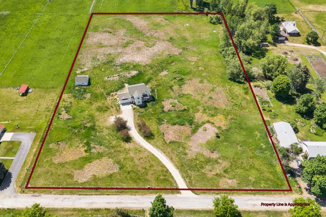 Aerial view of property's location featuring property parcel outlined | Image 66