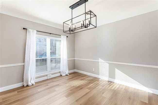 There is a formal dining room right next to the flex area/home office area | Image 9