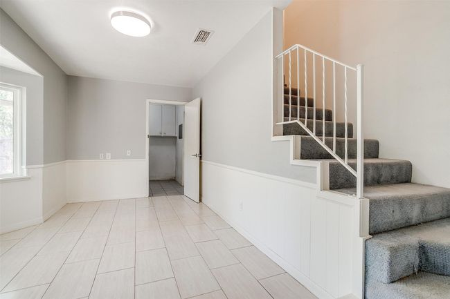 Stairway leading to the private second primary suite. | Image 21