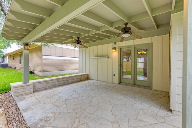 View of patio / terrace featuring a ceiling fan and french doors | Image 29