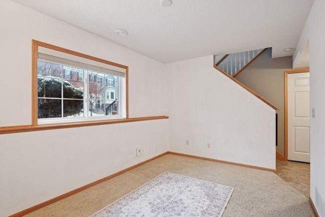 Family Room is spacious with natural light. | Image 36