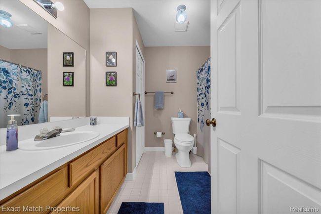 Ceramic tiled floor in the main bathroom | Image 32