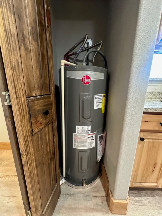 Utilities with water heater | Image 17