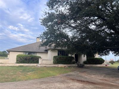 View of front of house featuring a front yard | Image 1