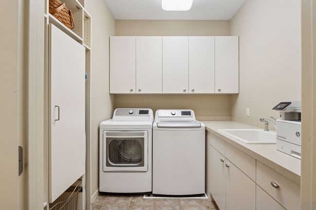 Laundry Room with sink and storage | Image 31