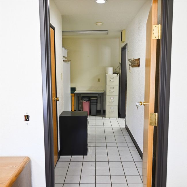 Hall featuring light tile patterned flooring | Image 15
