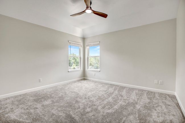 Bedroom 2 with ceiling fan | Image 17
