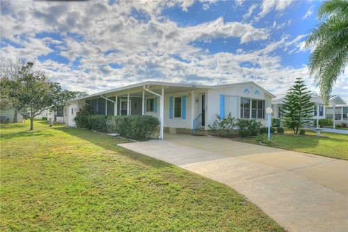 329 Macadamia Drive, Barefoot Bay, FL, 32976 | Card Image