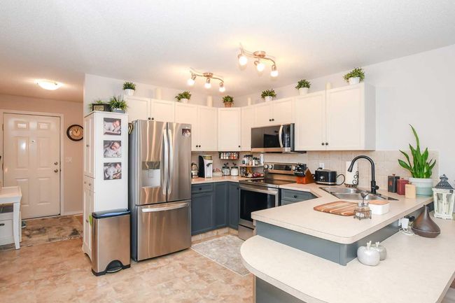 2004 - 5220 50a Ave, Home with 2 bedrooms, 2 bathrooms and 1 parking in Sylvan Lake AB | Image 5
