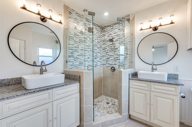 Bathroom featuring a stall shower, two vanities, and ceiling​​‌​​​​‌​​‌‌​‌‌​​​‌‌​​‌‌​‌​​​​​‌ fan | Image 15