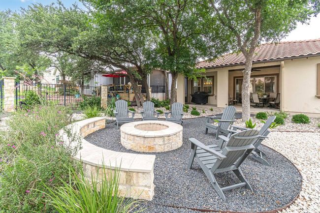 View of patio / terrace featuring an outdoor fire pit and a ceiling​​‌​​​​‌​​‌‌​‌‌​​​‌‌​​‌‌​‌​​​​​‌ fan | Image 37