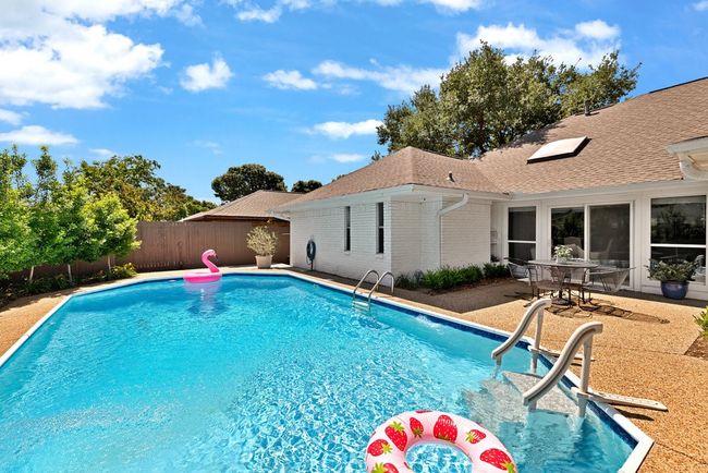 View of pool featuring a fenced backyard | Image 32