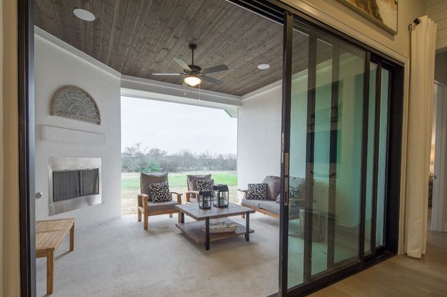 View of patio / terrace with ceiling fan | Image 25