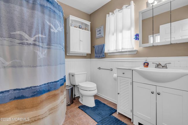 Main floor bath with shower stall adjacent exterior acess for future pool bathroom | Image 24