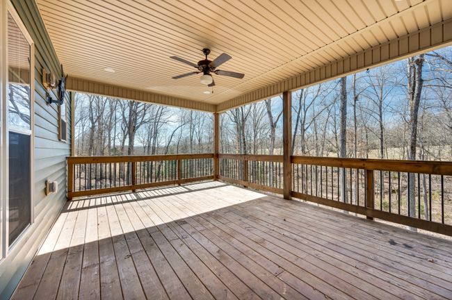 Porch area overlooking the beautiful backyard | Image 62