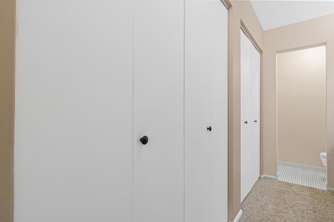 Closet Storage in Walk-Thru Closet for Organization | Image 15