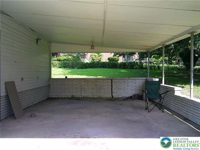 Covered car port or just extra sitting area | Image 26