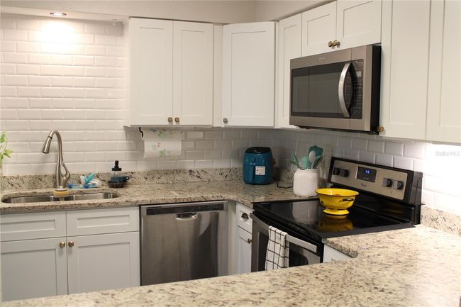 Beautiful Quartz counter tops and Subway tile backsplash. | Image 7