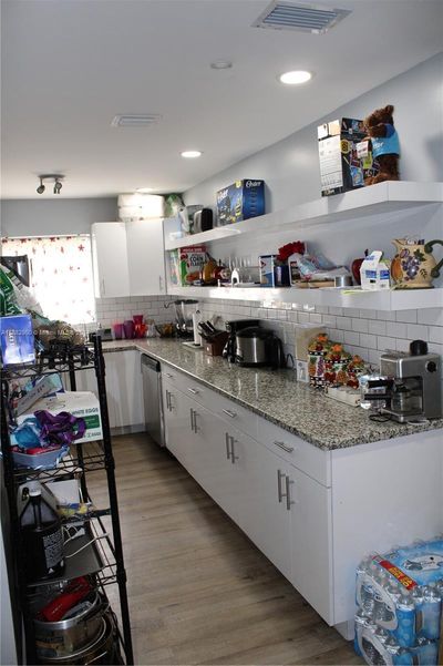 1620 Nw 51st St, House other with 4 bedrooms, 2 bathrooms and null parking in Miami FL | Image 3