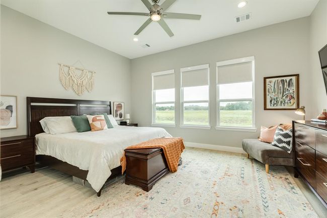 Step into the sanctuary of theprimary bedroom. | Image 21