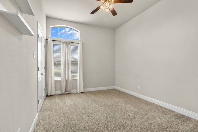 Unfurnished room featuring carpet flooring and a ceiling fan | Image 15