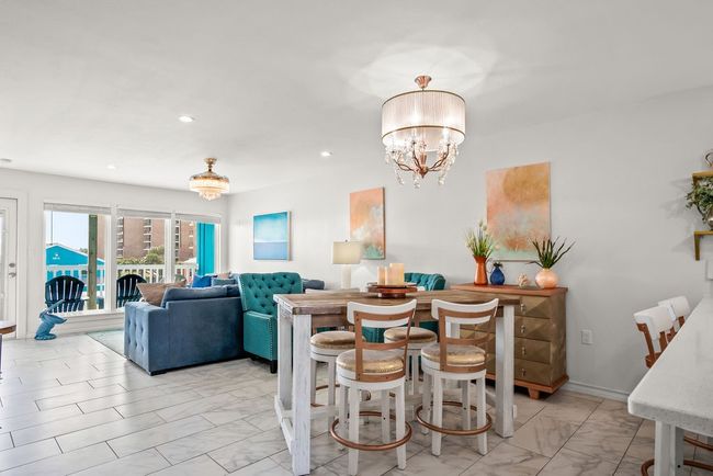 Ocean view throughout the main living, kitchen and dining | Image 12