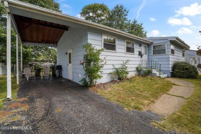 Large carport area could be enclosed forextra living space | Image 2