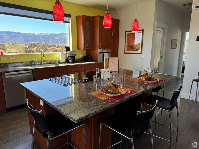 kitchen island in one of the rentals looking west | Image 34