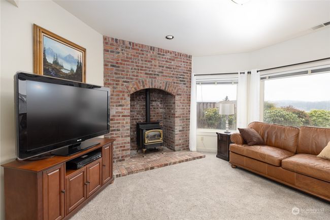 Family room with gas freestanding stove | Image 34