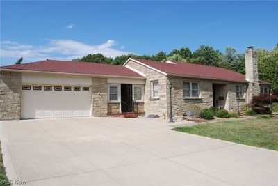 Ranch-style house with a garage | Image 2