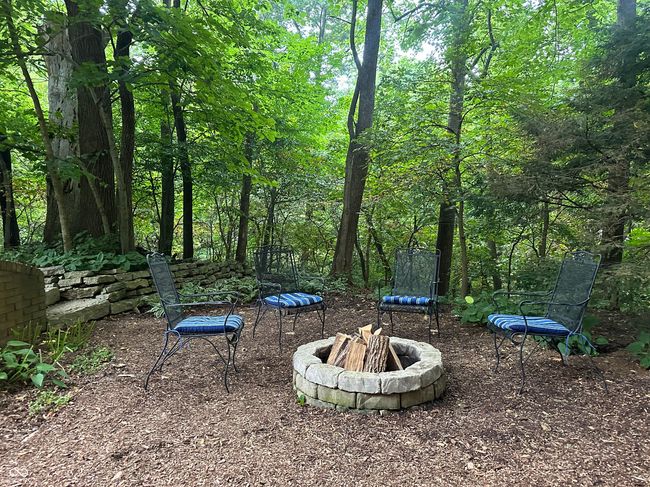 The walk out lower level leads to the Fire Pit | Image 34