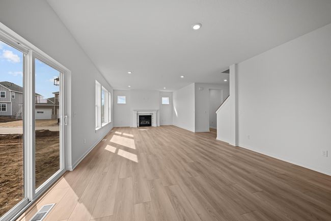 The 15x12 dining area is an extension of the living are and kitchen creating a beautiful space for family and friends. | Image 6