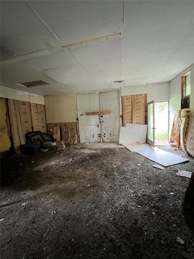 inside the garage looking towards the doors | Image 105