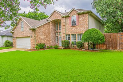 Front of property featuring a garage and a front lawn | Image 2