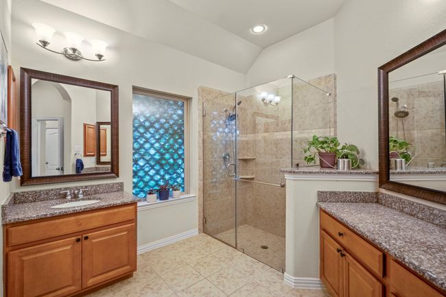 Primary Bath with dual sinks and incredible, oversized shower with seamless glass | Image 20
