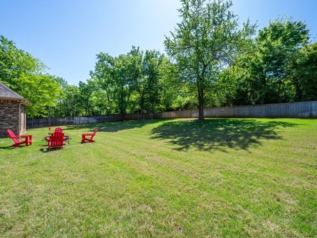 View of yard with fence | Image 39