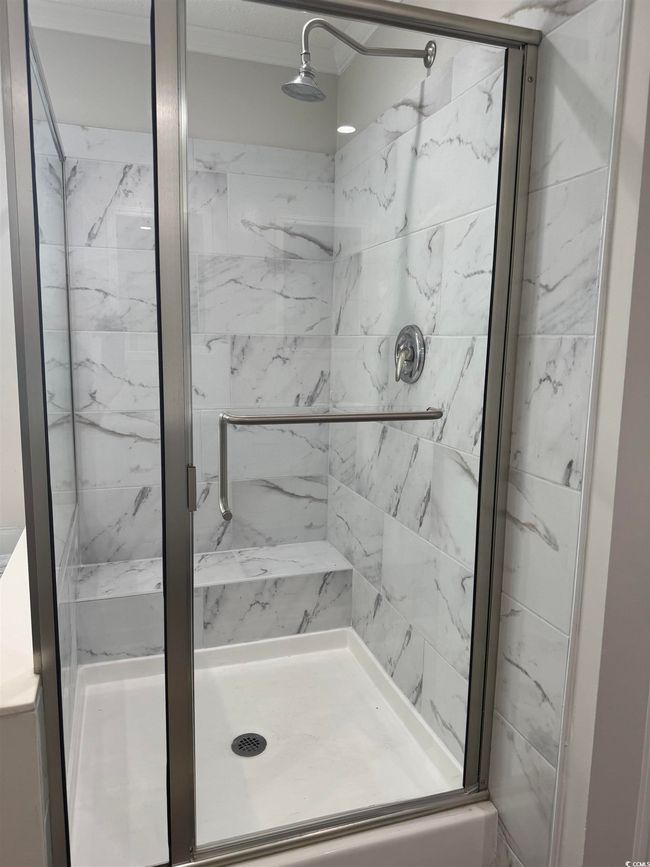 Full bath with a marble finish shower | Image 20
