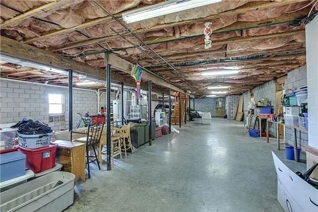 Basement's sq ft of 3, 000 sq ft includes a storm shelter/room under the front porch. | Image 36