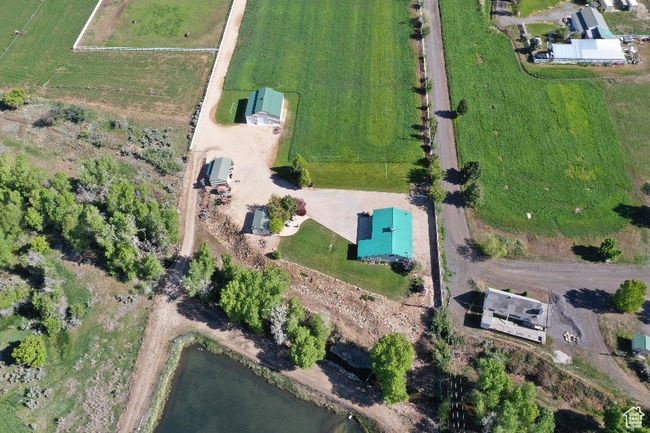 Aerial view of property's location with rural landscape and a nearby body of water | Image 41