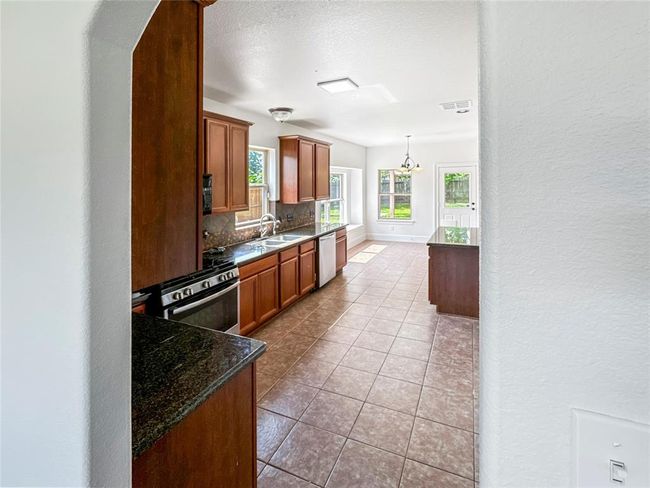 16019 Rustlers Trail Ln, House other with 5 bedrooms, 3 bathrooms and 2 parking in Cypress TX | Image 6