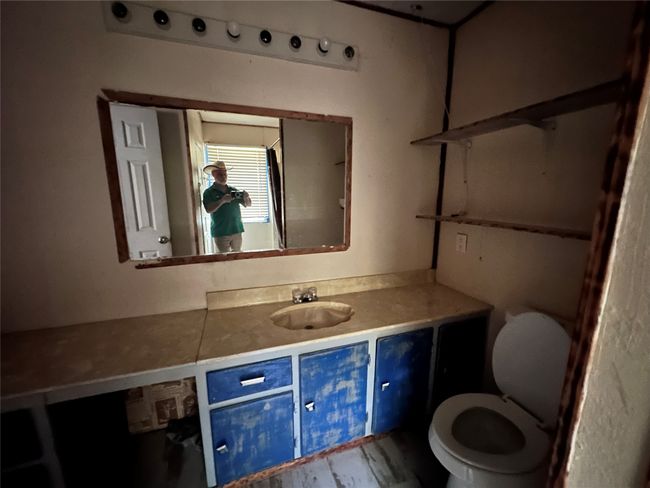 Bathroom with toilet and vanity | Image 16
