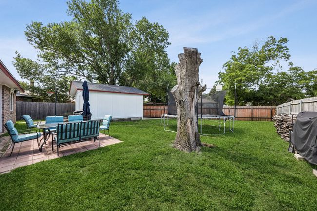Large fenced backyard. | Image 24