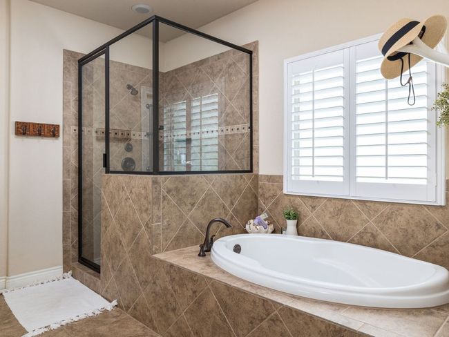 Soaking tub and an oversized walk-in shower | Image 16