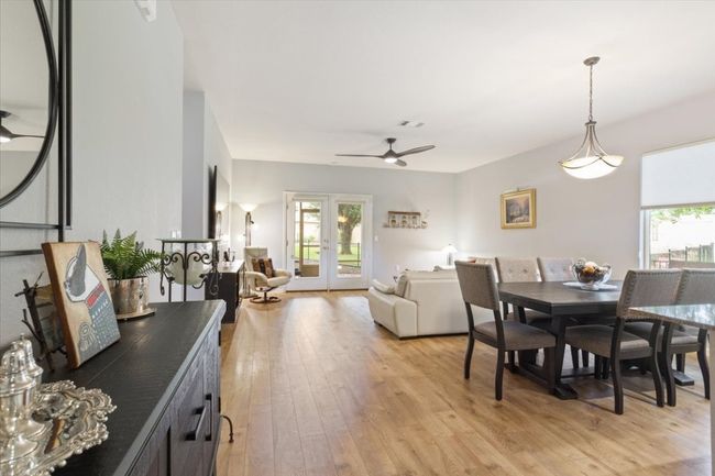 Open view from dining to living all with laminate flooring | Image 7