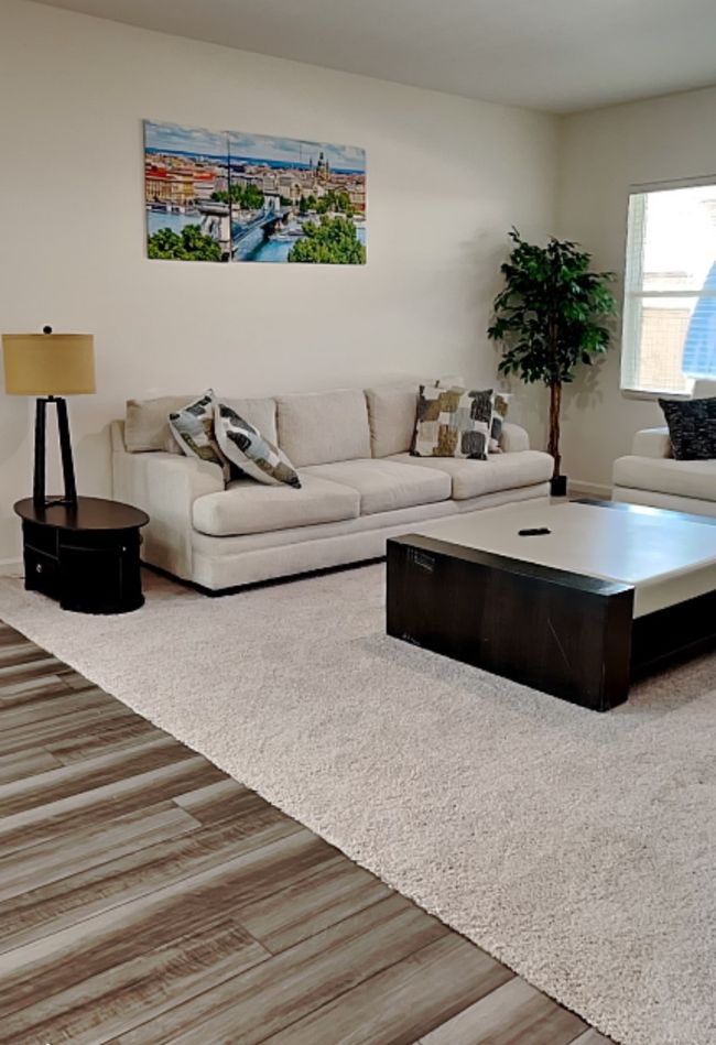 Living room with wood finished floors | Image 14