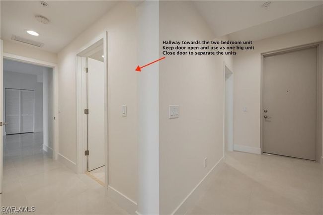 Corridor featuring baseboards and light tile patterned floors | Image 26