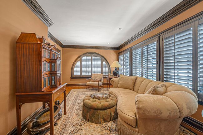 Living room featuring baseboards and ornamental molding | Image 14