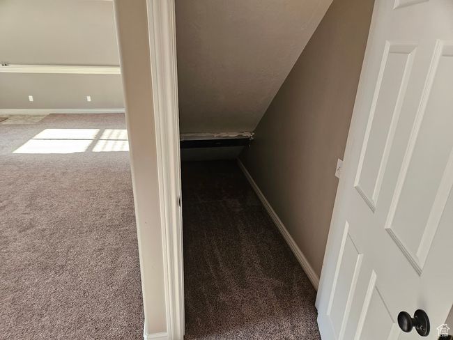 Hallway with baseboards and carpet floors | Image 40